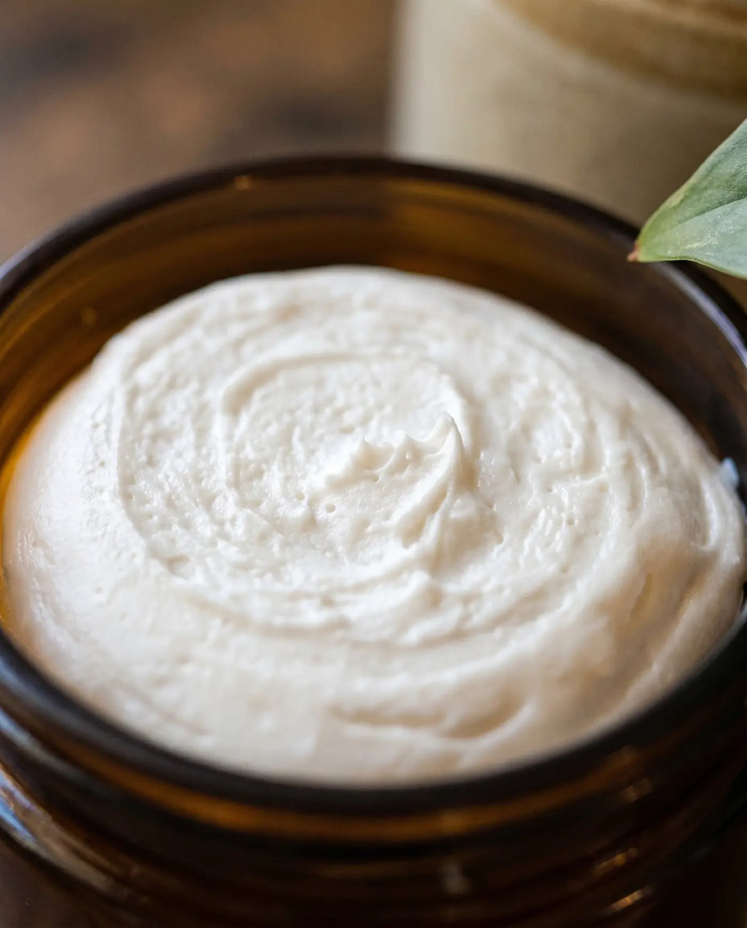 Macro of soft peaked whipped white tallow showing its airy cloud-like texture
