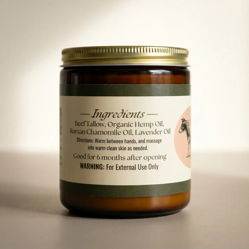 Roman Chamomile and Lavender body butter 8oz jar, ingredients back panel with cow emblem, studio product shot.