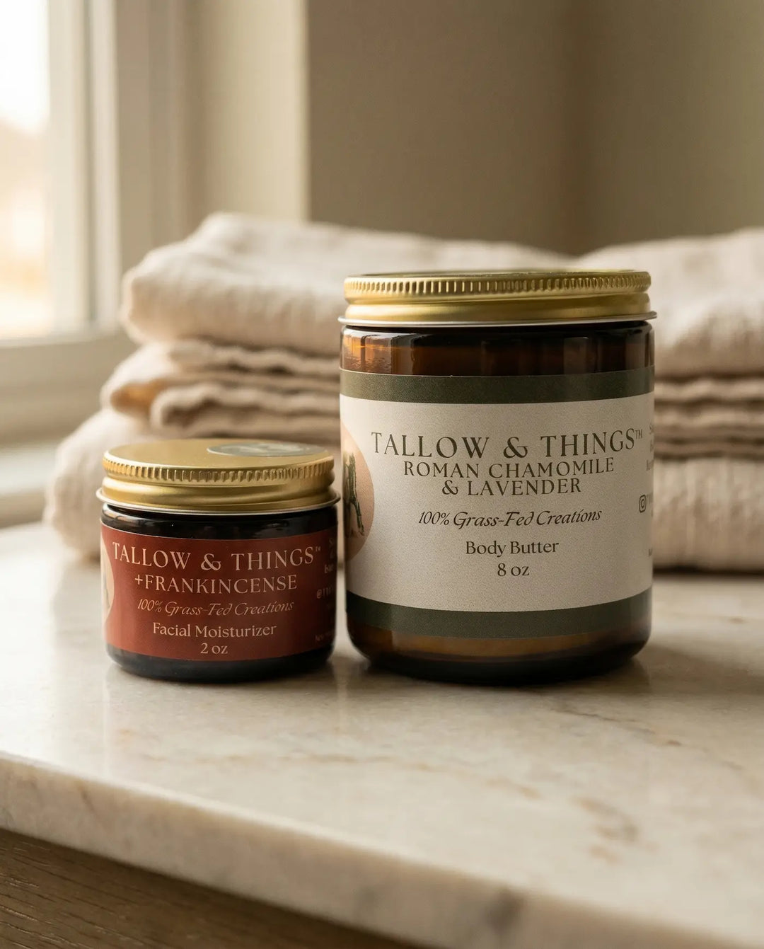 Frankincense facial moisturizer 2oz and Roman Chamomile Lavender body butter 8oz bundle on linen, farmhouse setting.