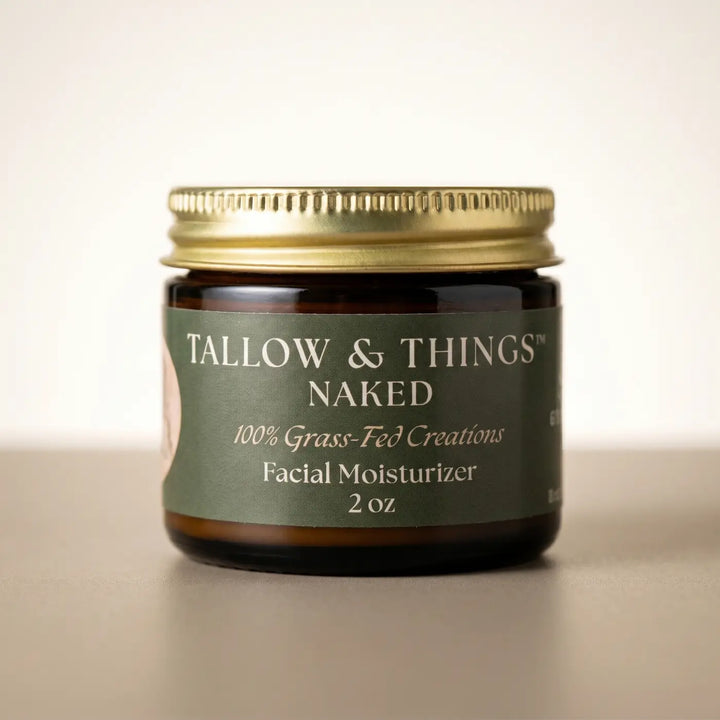 Naked tallow facial moisturizer 2oz jar, sage-green front label, studio product shot.
